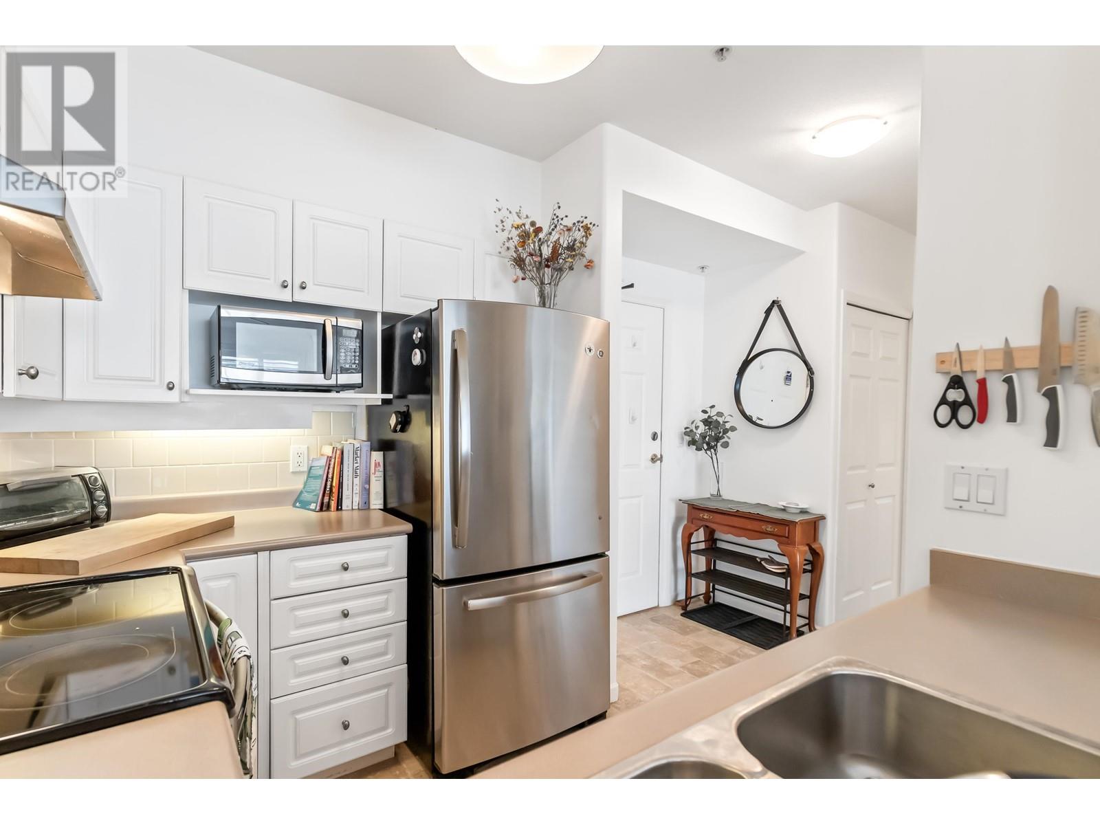 207 3608 DEERCREST DRIVE