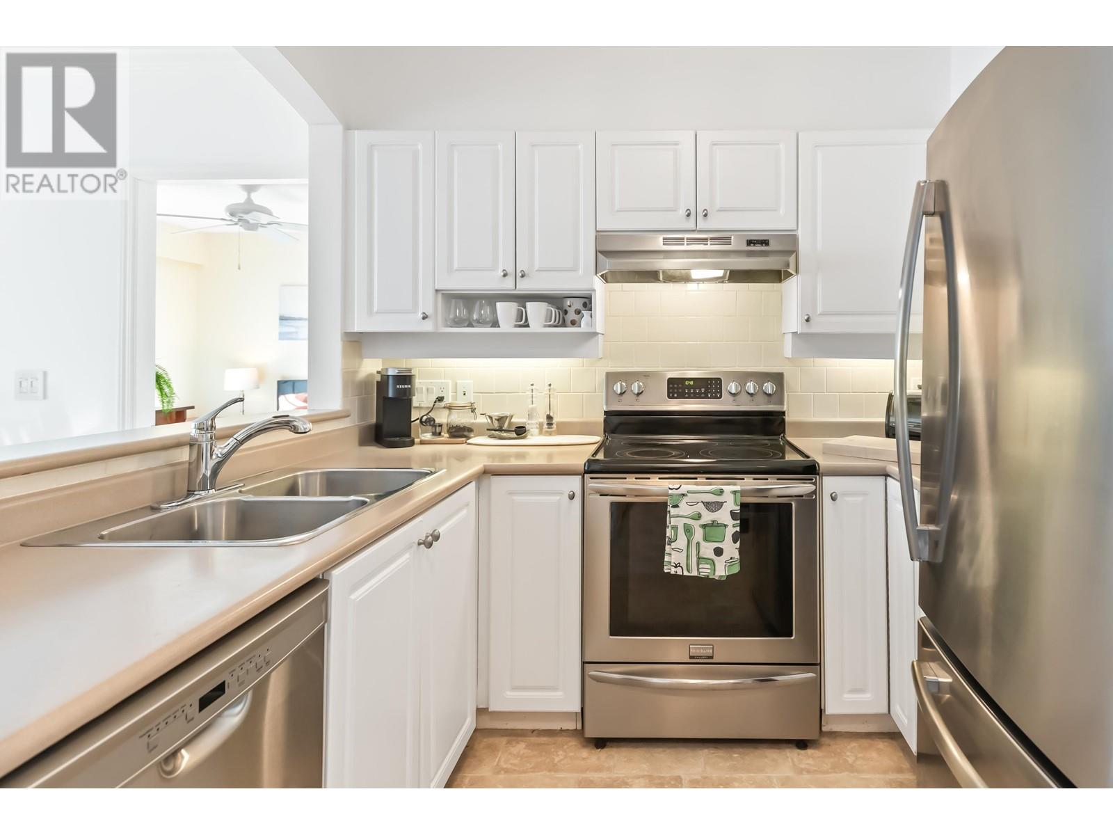 207 3608 DEERCREST DRIVE