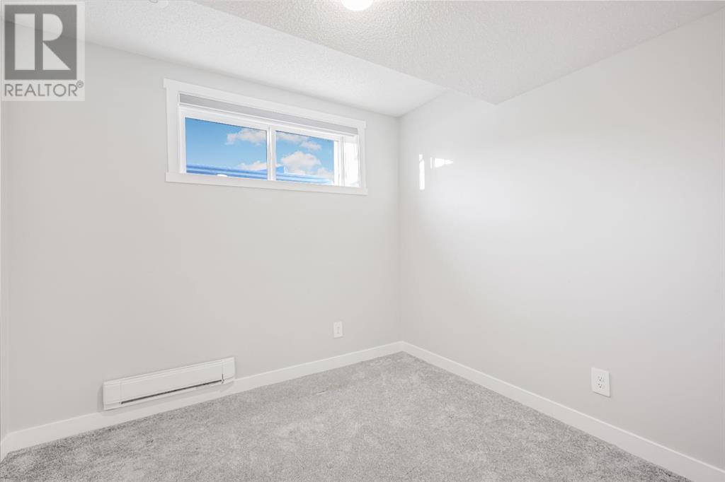 157 Belmont Drive Sw, Calgary, Alberta  T0L 0X0 - Photo 34 - A2188826