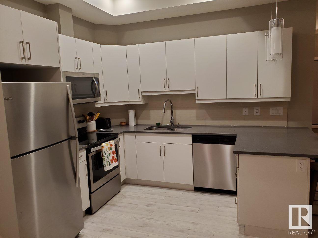 Property at #103 10006 83 AV NW image 4