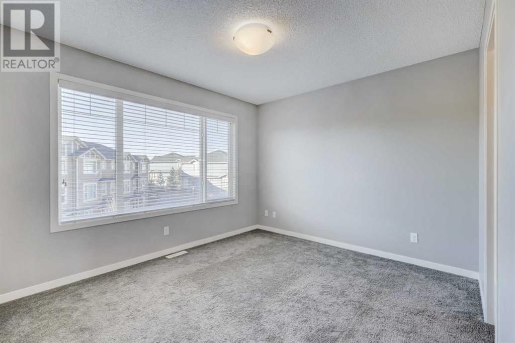 550 Panatella Walk Nw, Calgary, Alberta  T3K 0Z4 - Photo 13 - A2190848