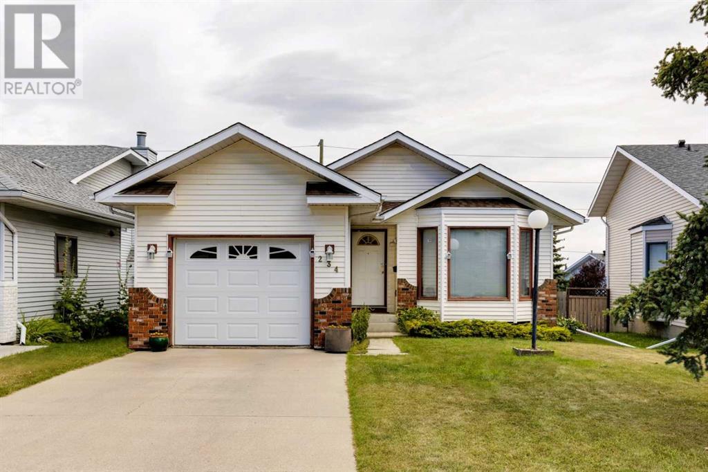 234 Sandstone Drive Nw, Calgary, Alberta  T3K 3S6 - Photo 1 - A2161447