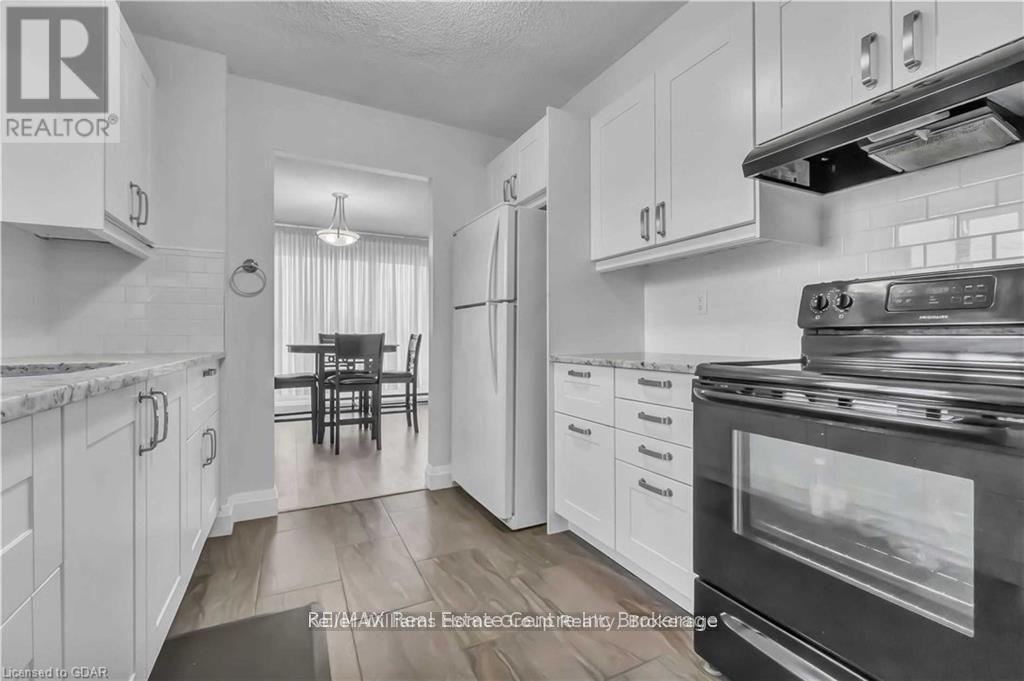 205 - 358 Waterloo Avenue, Guelph, Ontario  N1H 7Y3 - Photo 4 - X11957440