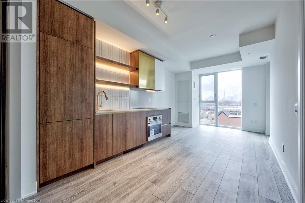 1285 Queen Street E Unit# 514, Toronto, Ontario  M4L 1C2 - Photo 1 - 40697023