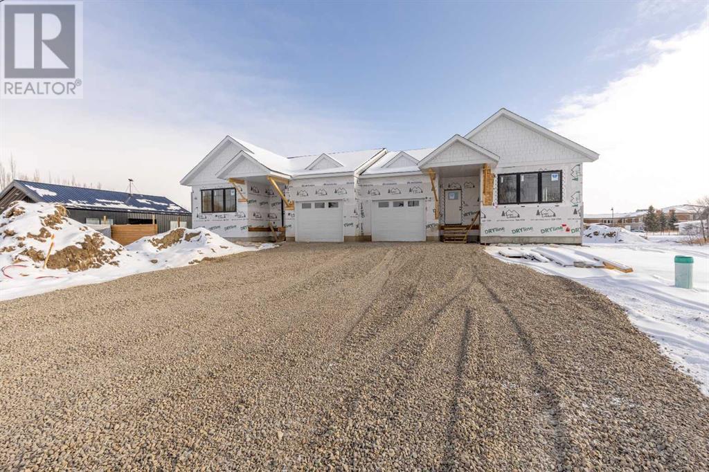 309, 311 S 100 W, Raymond, Alberta  T0K 2S0 - Photo 2 - A2191039