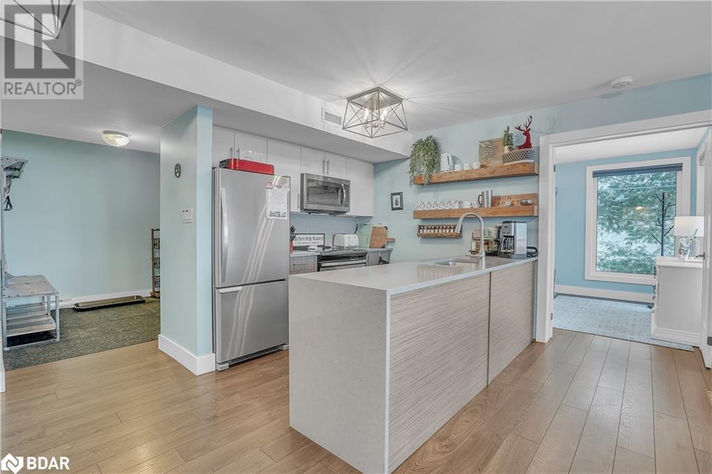 1 Tree Tops Lane Unit# 201, Huntsville, Ontario  P1H 1A9 - Photo 2 - 40698176