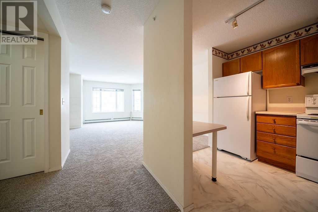 1210, 1000 Sienna Park Green Sw, Calgary, Alberta  T3H 3N7 - Photo 3 - A2193070