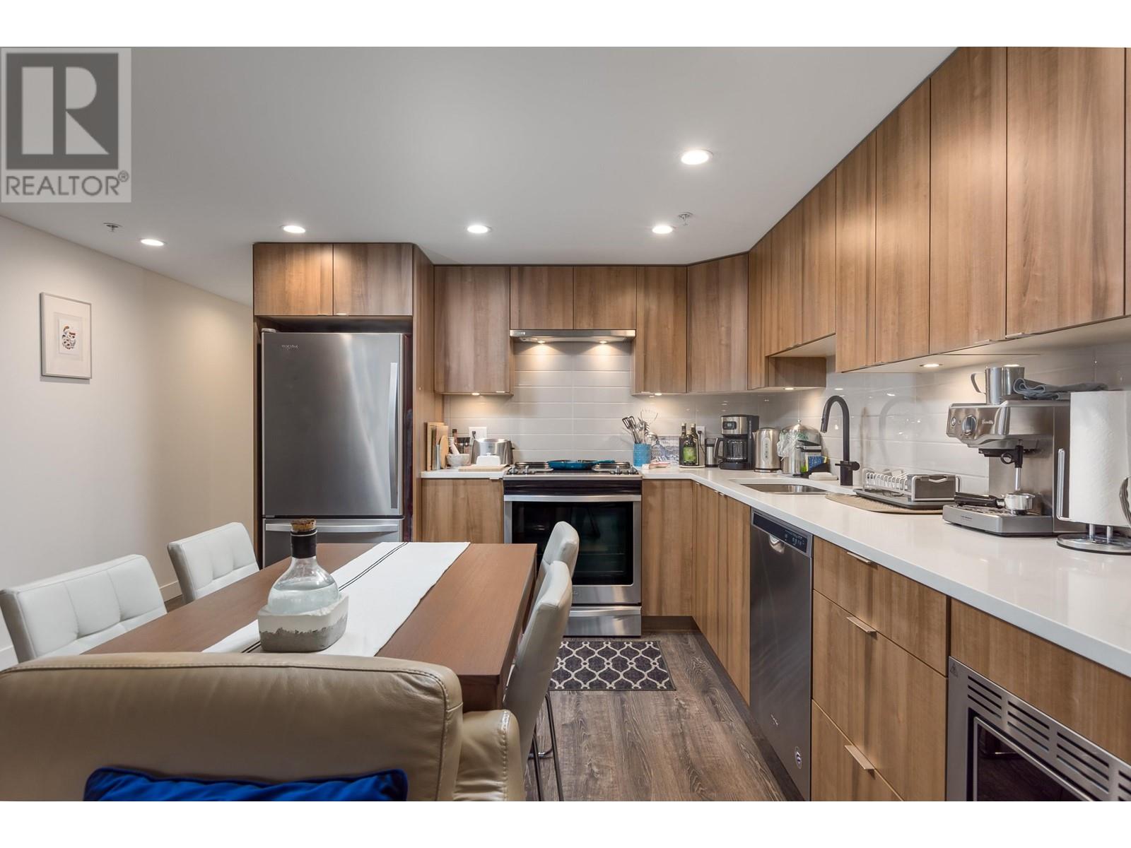 Property at 304 1365 PEMBERTON AVENUE image 2