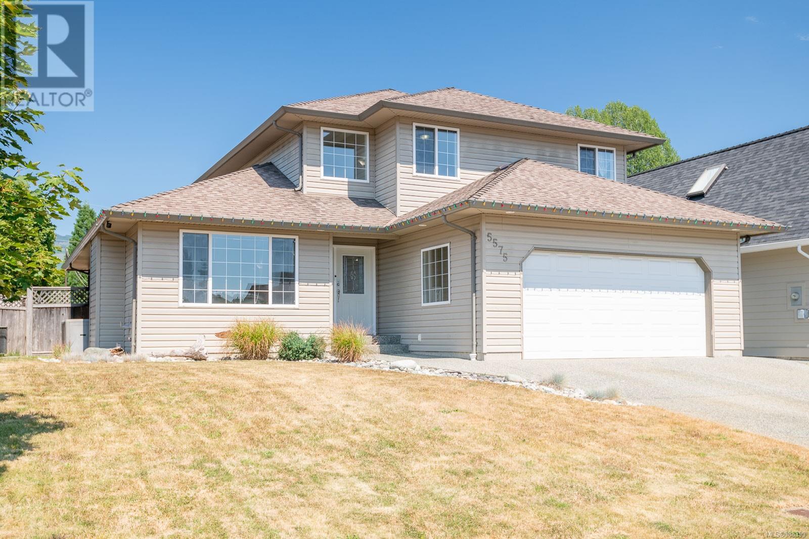 Property at 5575 Woodland Cres E image 1