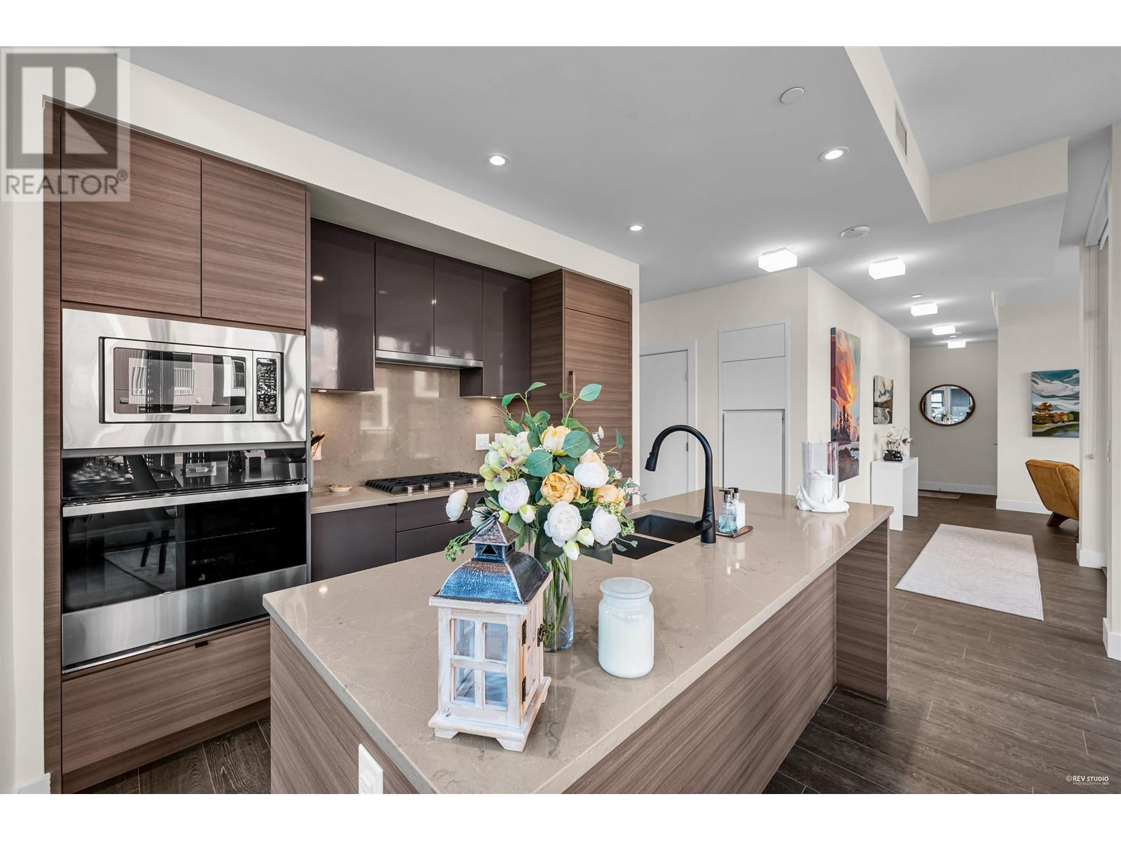 415 3438 Sawmill Crescent, Vancouver, British Columbia  V5S 0E3 - Photo 1 - R2967667