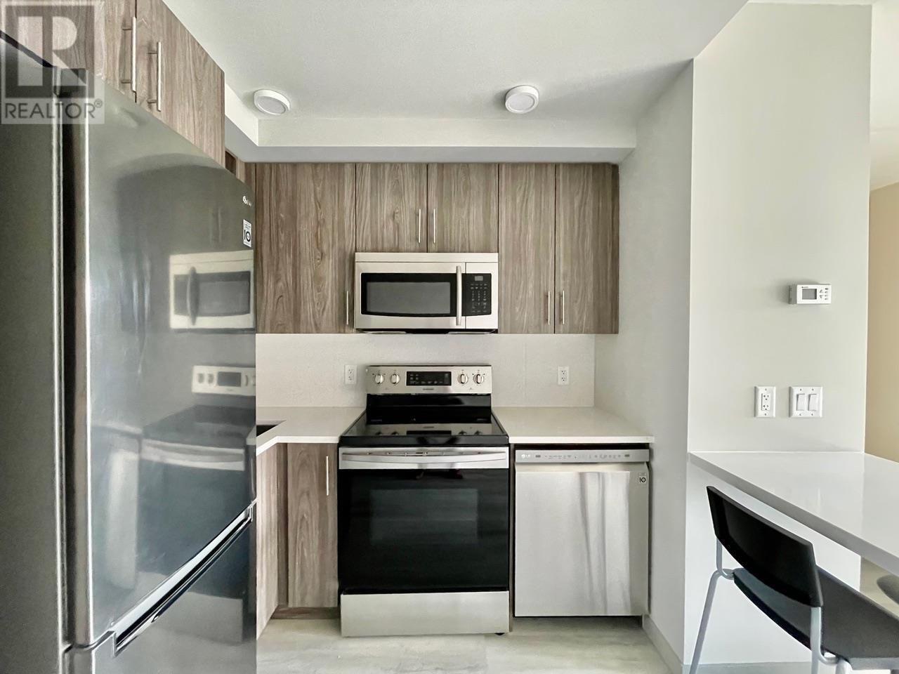 Property at 345 Dougall Road N Unit# 102 image 2