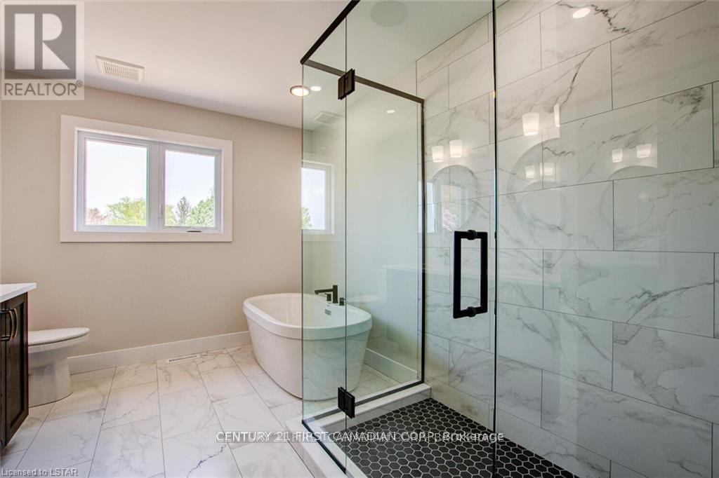 129 Aspen Circle, Thames Centre, Ontario  N0M 2P0 - Photo 36 - X11933342