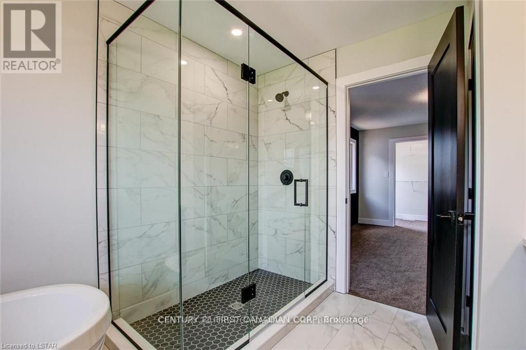 129 Aspen Circle, Thames Centre, Ontario  N0M 2P0 - Photo 38 - X11933342