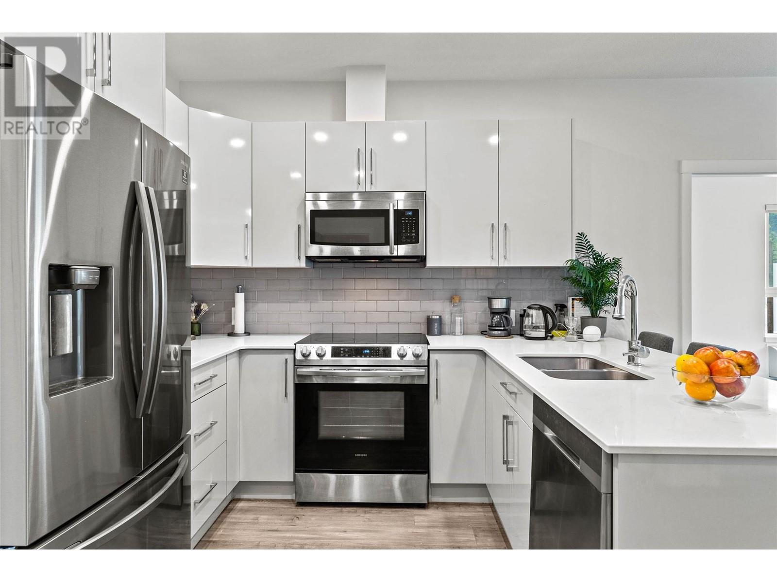 Property at 1880 HUGH ALLAN Drive Unit# 107 image 2