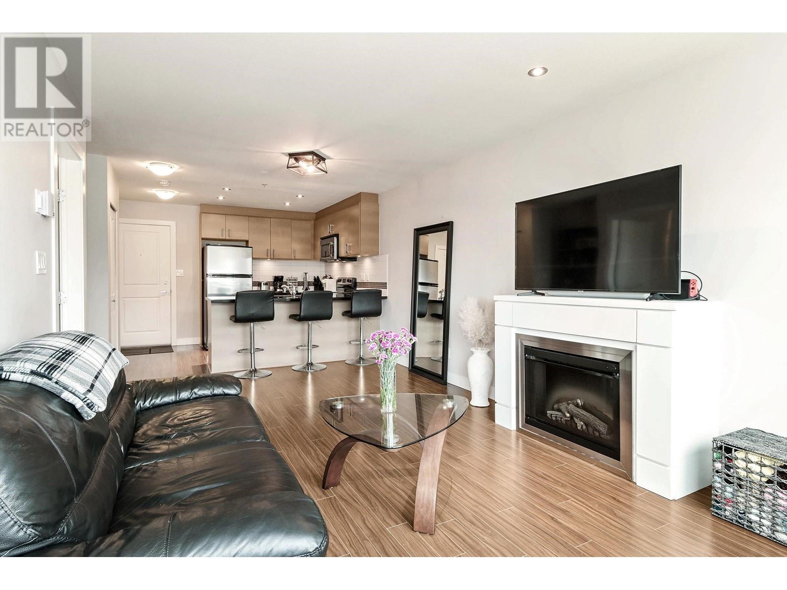 202 12069 Harris Road, Pitt Meadows, British Columbia  V3Y 0C8 - Photo 2 - R2969360