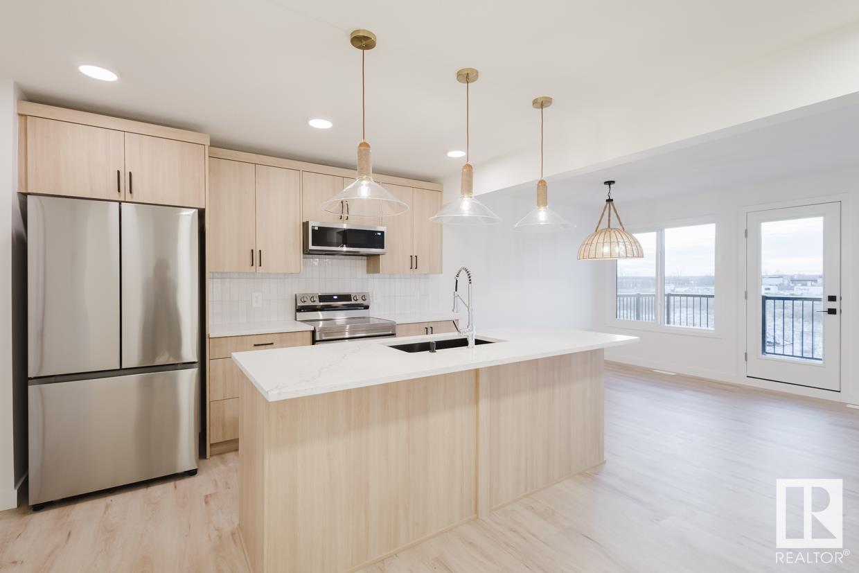 Property at #49 1010 MILLBOURNE RD NW image 1