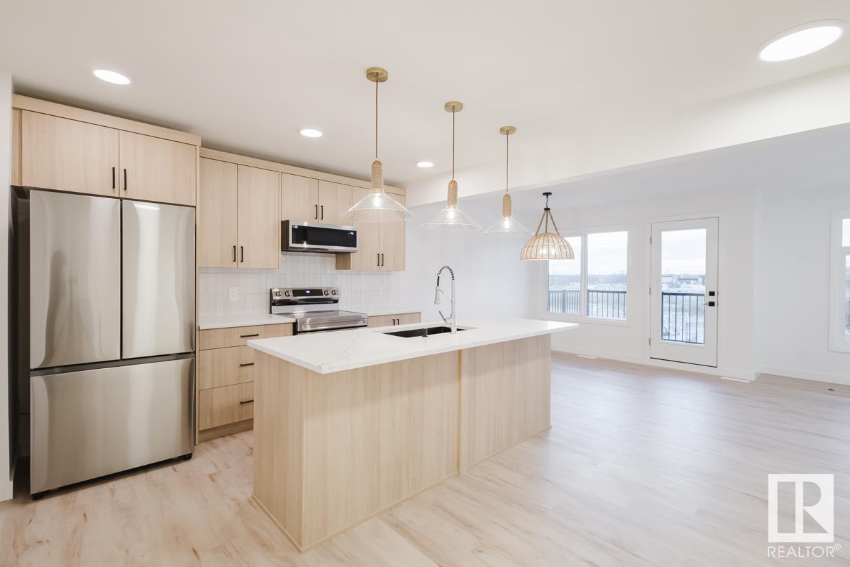 Property at #49 1010 MILLBOURNE RD NW image 5