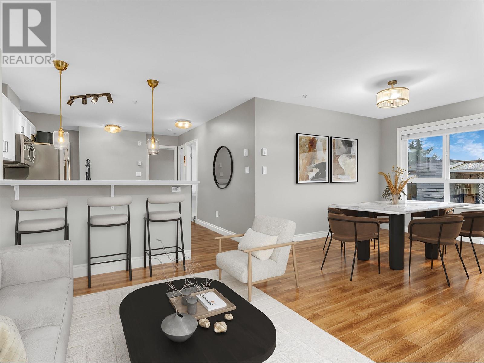 303 128 W 21 Street, North Vancouver, British Columbia  V7M 1Y9 - Photo 1 - R2970275