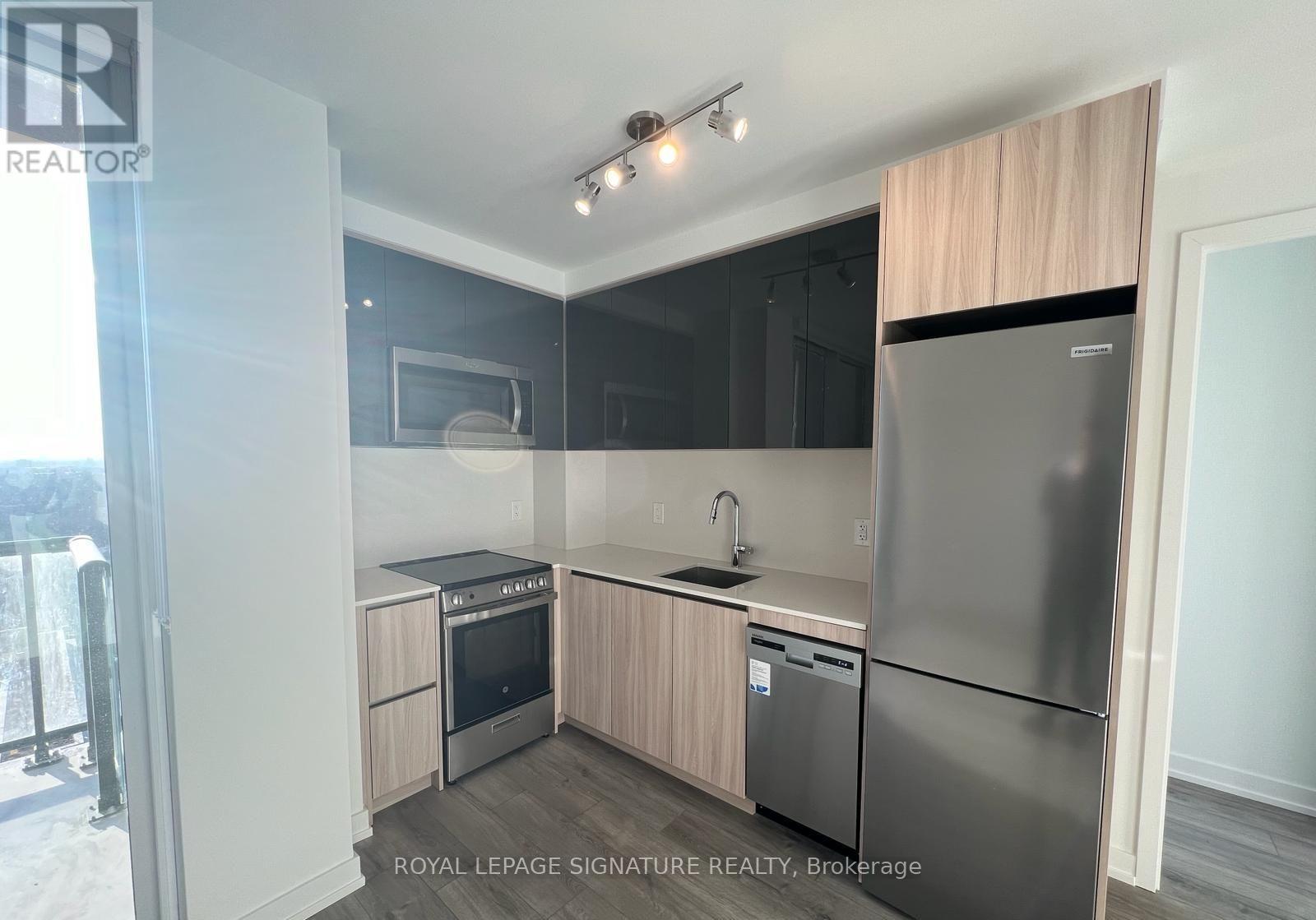 1003 - 3100 Keele Street, Toronto, Ontario  M3M 2H4 - Photo 3 - W11988371