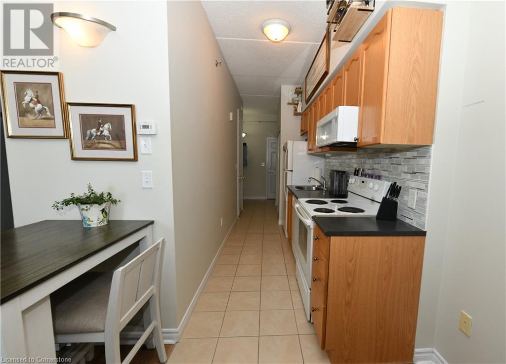 308 Watson Parkway N Unit# 118, Guelph, Ontario  N1E 0G7 - Photo 3 - 40701576