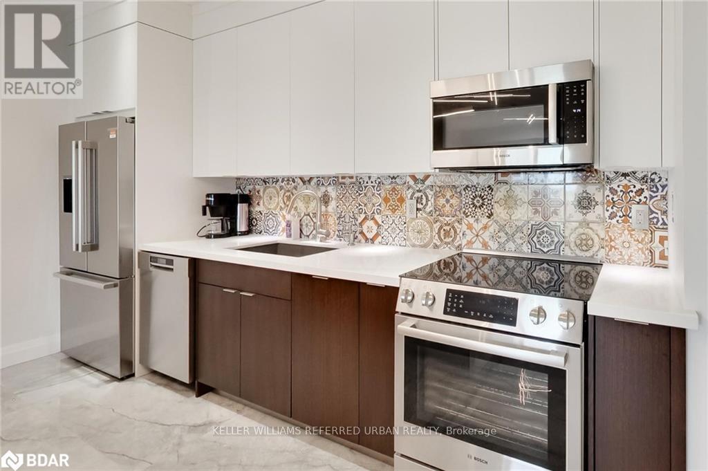 Property at 309 - 295 CUNDLES ROAD E image 4