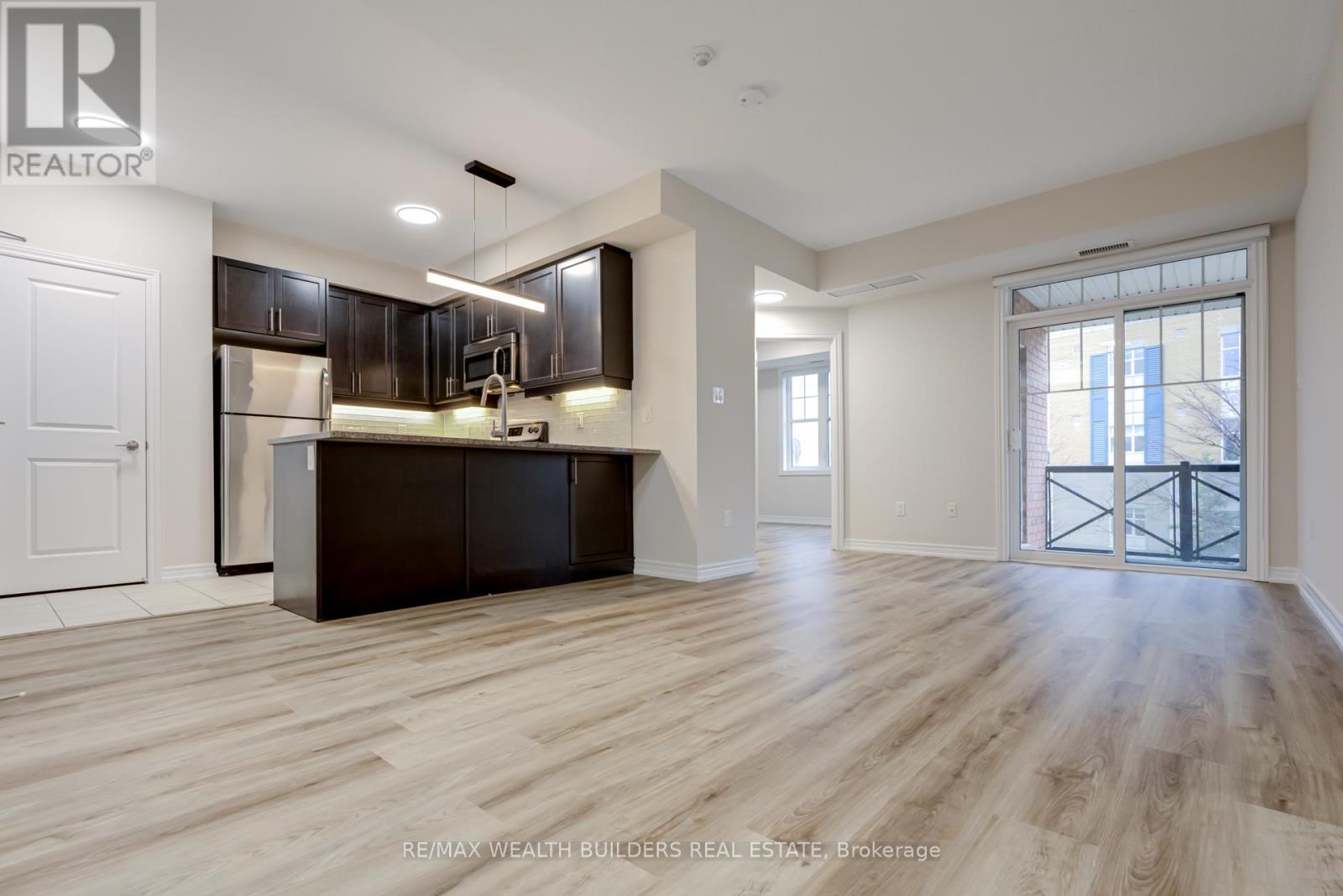 Property at 202 - 2333 SAWGRASS DRIVE image 1