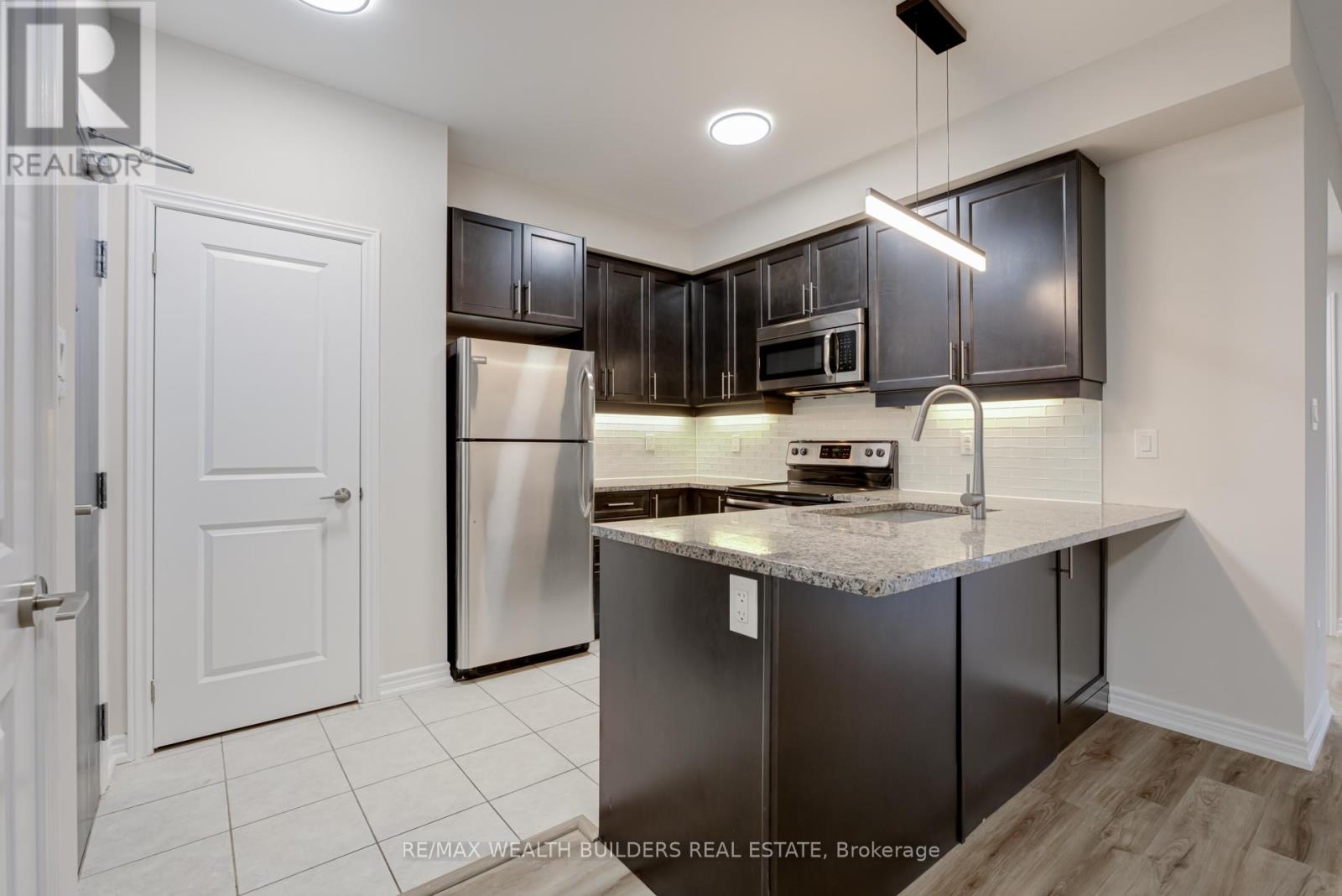Property at 202 - 2333 SAWGRASS DRIVE image 3