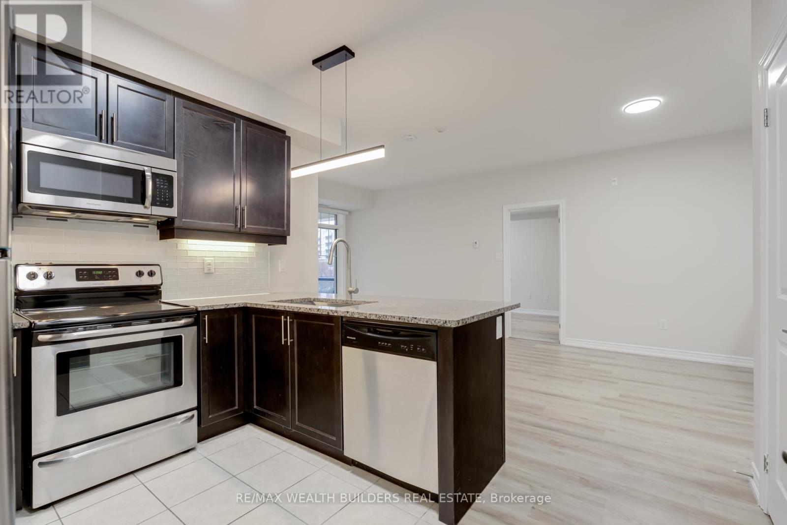 Property at 202 - 2333 SAWGRASS DRIVE image 5