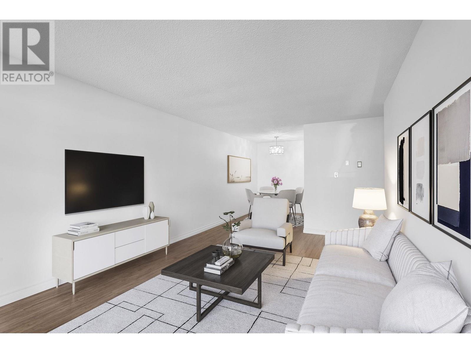 304 330 E 1st Street, North Vancouver, British Columbia  V7L 1B5 - Photo 2 - R2972661