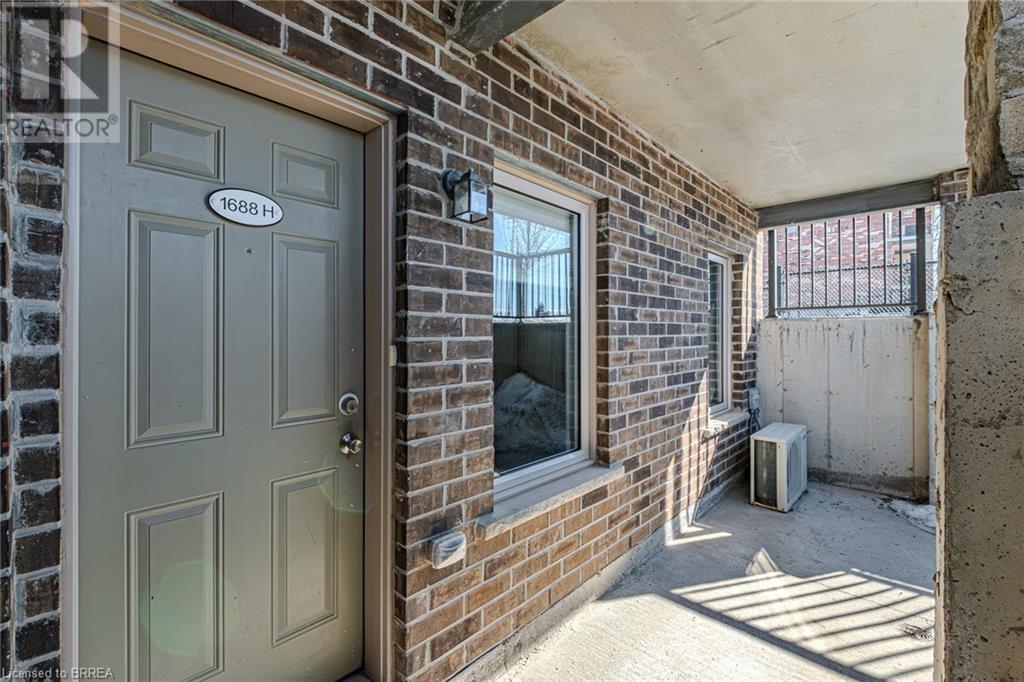 1688 Fischer Hallman Road Unit# H, Kitchener, Ontario  N2R 0H6 - Photo 2 - 40701924