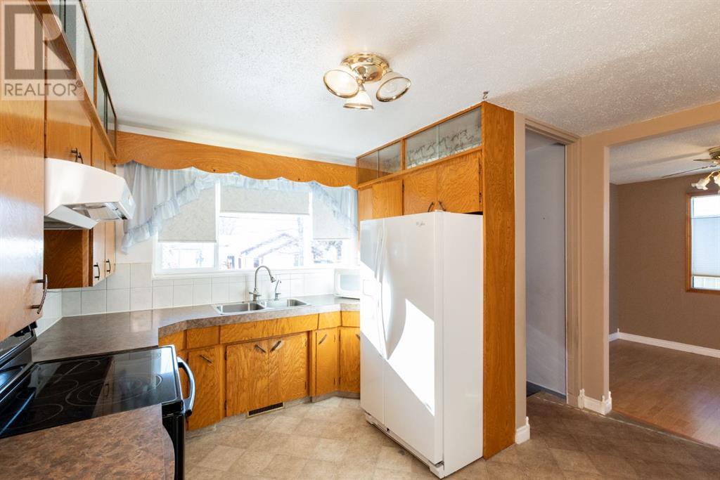 5023 40 Street, Innisfail, Alberta  T4G 1H8 - Photo 9 - A2198875