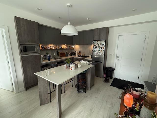 205 14225 103A AVENUE, Surrey real estate listing R2973025 for sale