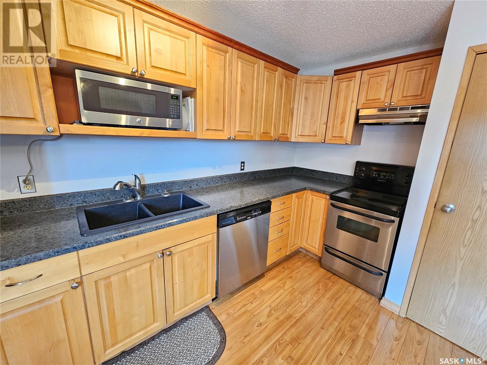 209 59 Wood Lily Drive, Moose Jaw, Saskatchewan  S6J 1H1 - Photo 3 - SK997054