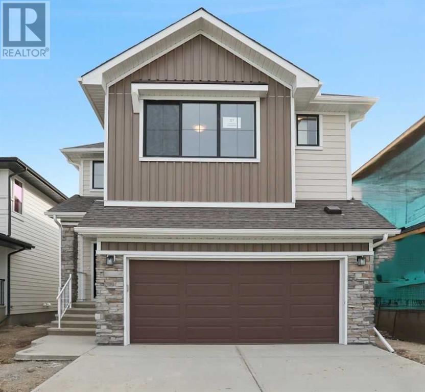 Property at 540 Buffaloberry Manor SE image 2