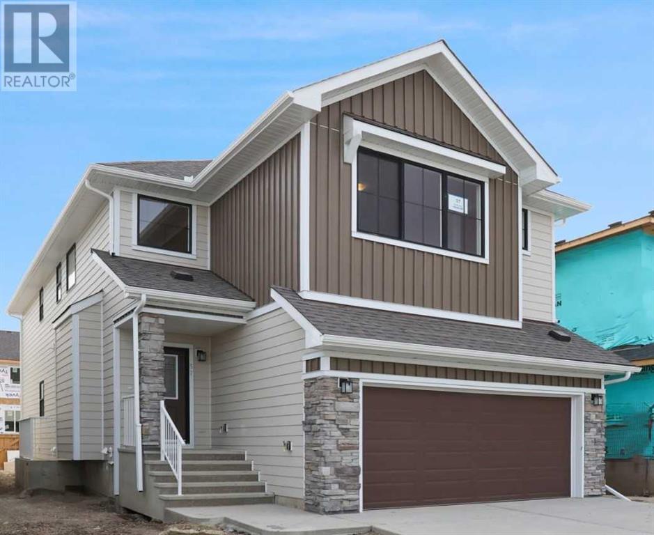 Property at 540 Buffaloberry Manor SE image 3