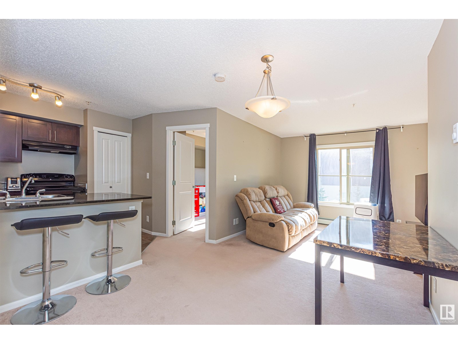 Property at #215 5816 MULLEN PL NW image 4