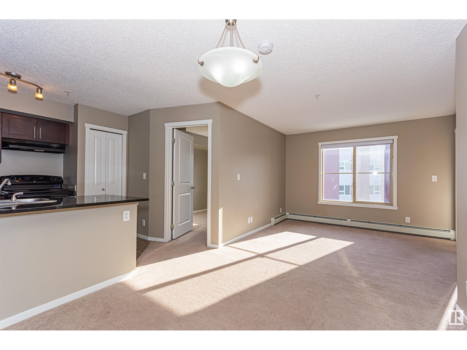 Property at #315 5816 MULLEN PL NW image 4