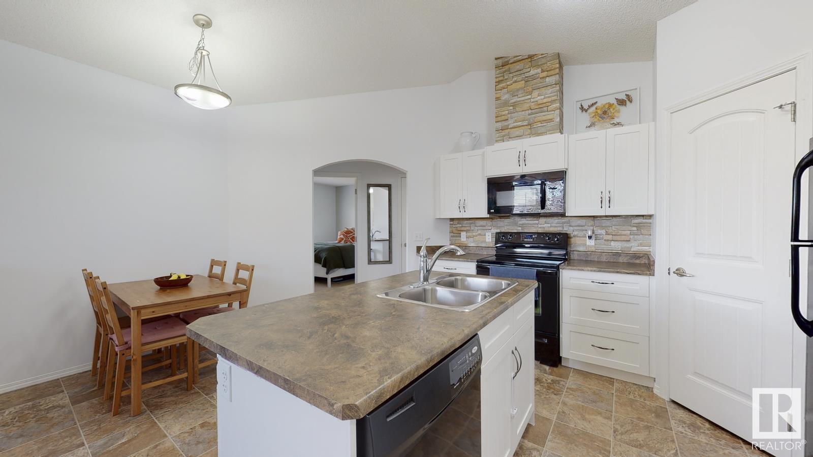 Property at #75 604 62 ST SW image 4