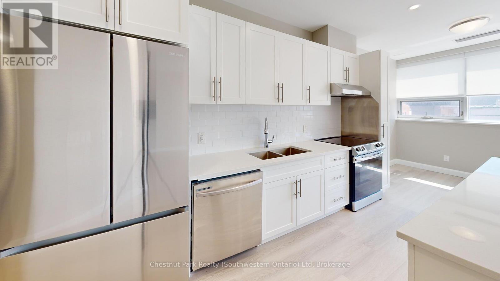 206 - 2 Quebec Street, Guelph, Ontario  N1H 2T2 - Photo 2 - X12004320