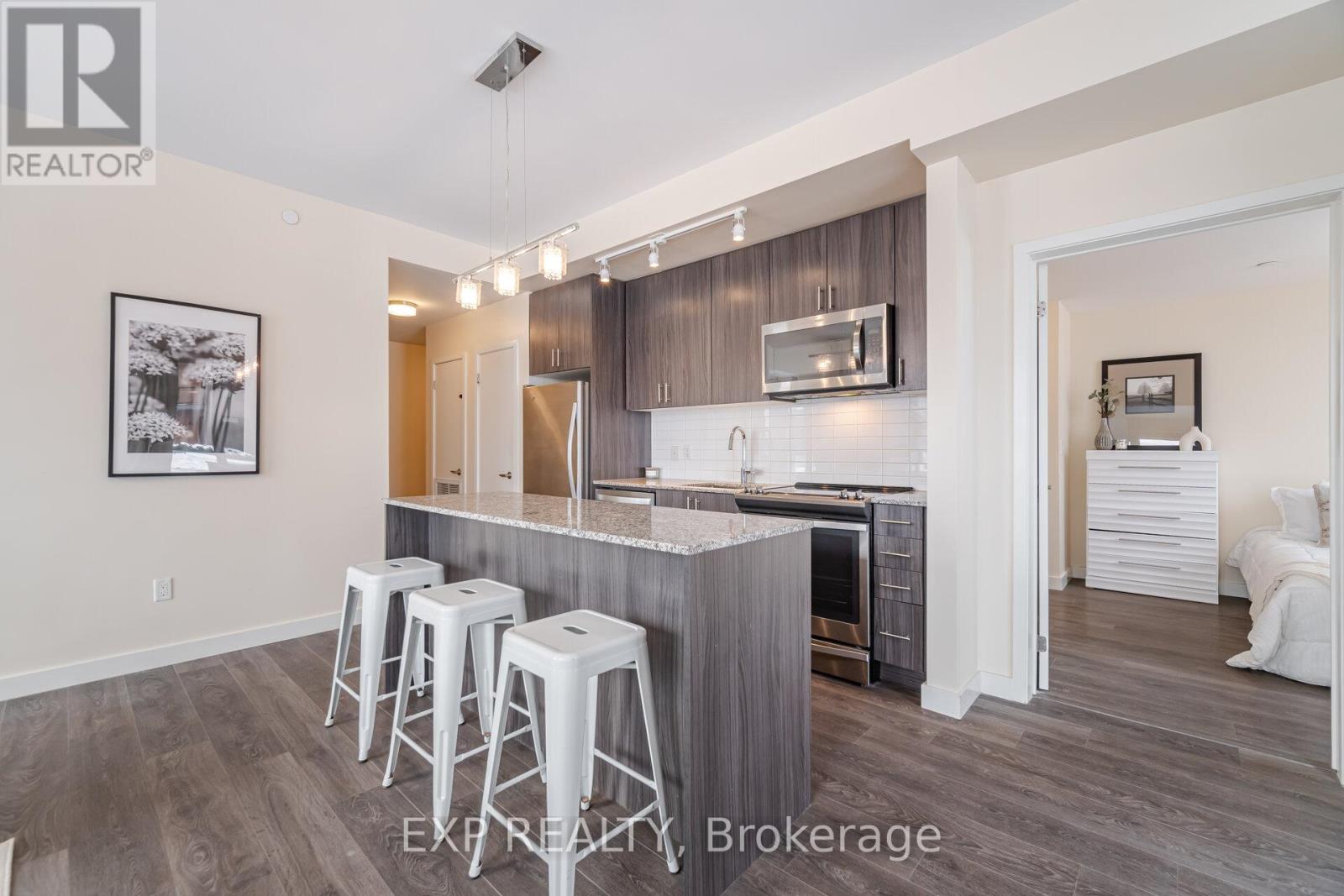 113 - 150 Sabina Drive, Oakville, Ontario  L6H 7C3 - Photo 6 - W12005202