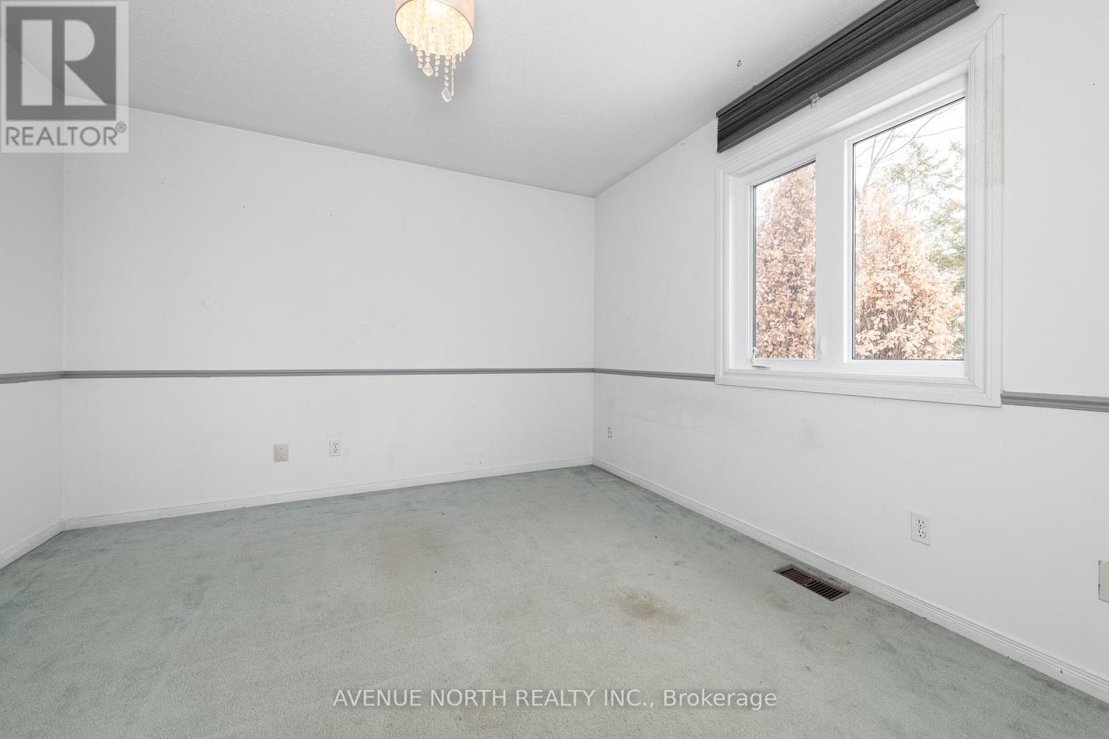 2059 Rolling Brook Drive, Ottawa, Ontario  K1W 1E2 - Photo 24 - X12007817