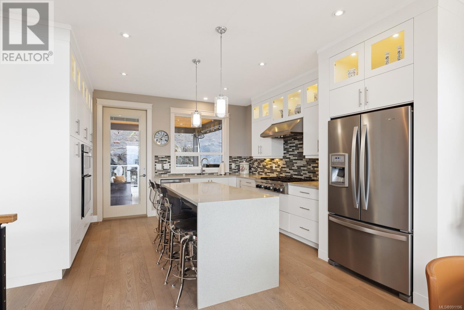 Property at 6089 Sansum Dr image 3