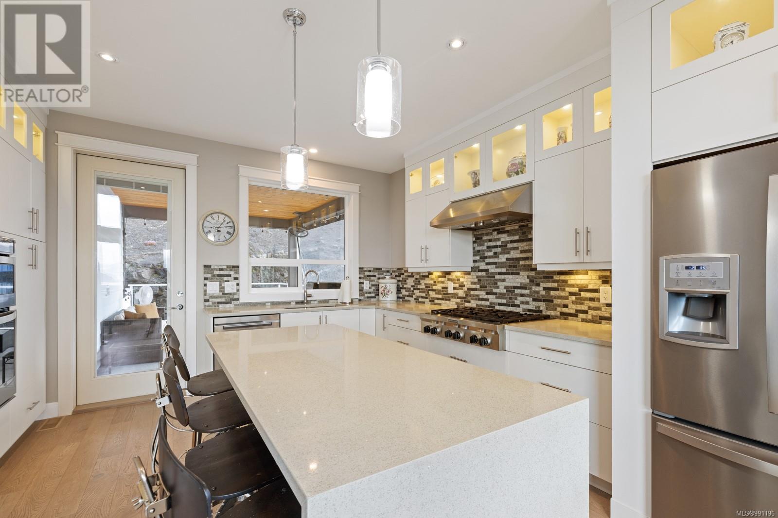 Property at 6089 Sansum Dr image 4