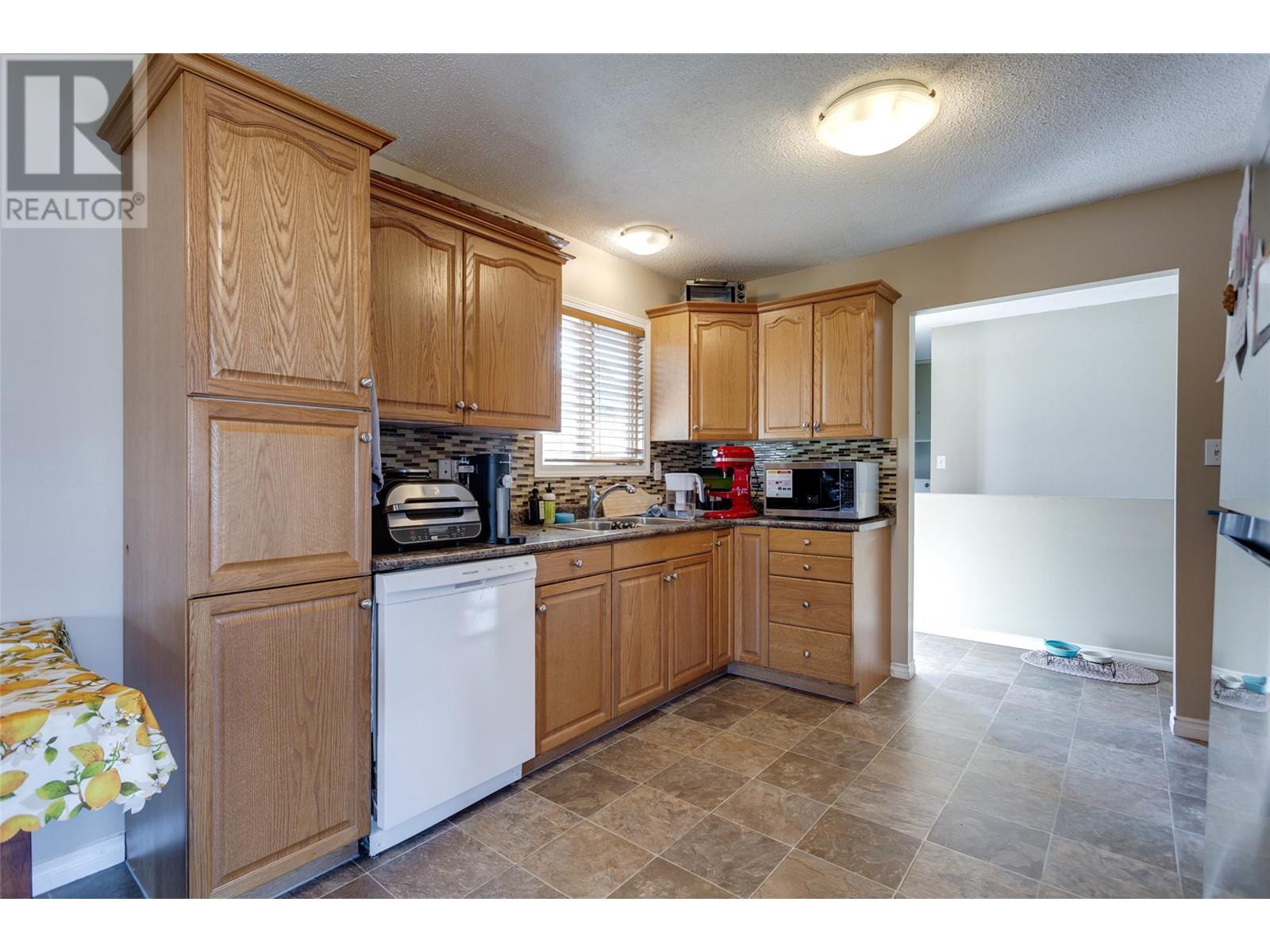 1335 Aldon Road, Kelowna, British Columbia  V1X 5A1 - Photo 8 - 10338125