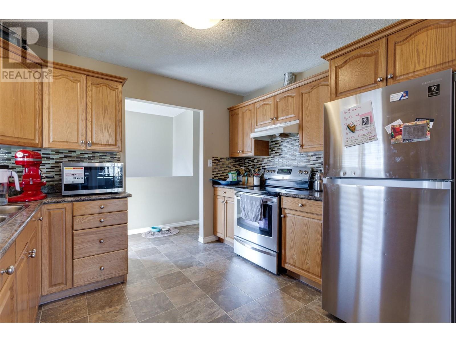 1335 Aldon Road, Kelowna, British Columbia  V1X 5A1 - Photo 9 - 10338125
