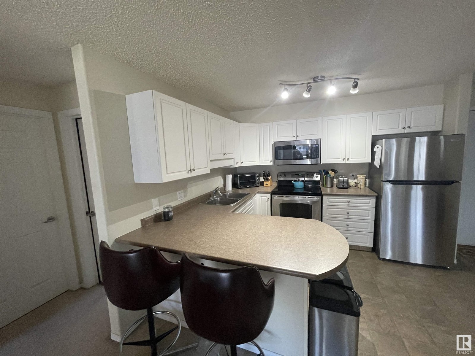 Property at #210 13625 34 ST NW image 3