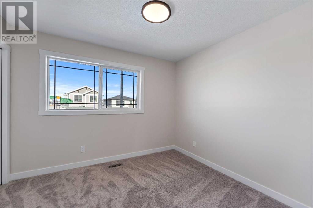 1003 Bayview Crescent Sw, Airdrie, Alberta  T4B 3N6 - Photo 21 - A2191136