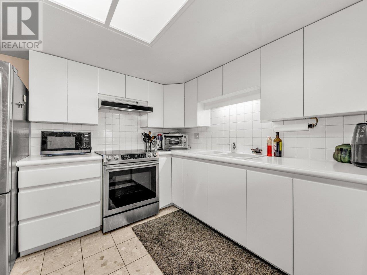308 168 Chadwick Court, North Vancouver, British Columbia  V7M 3L4 - Photo 2 - R2974918
