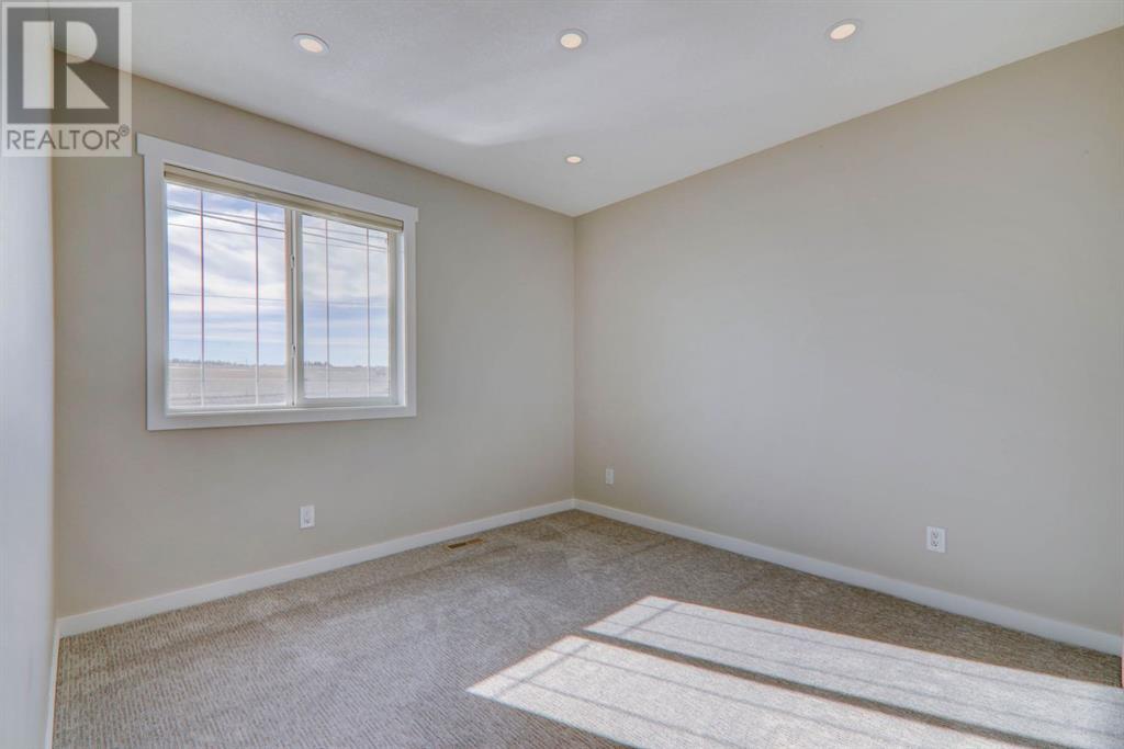 119 Cimarron Vista Crescent, Okotoks, Alberta  T1S 0K2 - Photo 29 - A2198824