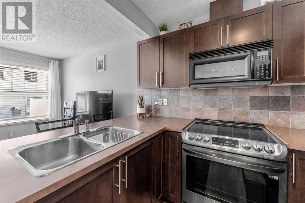 13 Covemeadow Manor Ne, Calgary, Alberta  T3K 6G5 - Photo 6 - A2199602